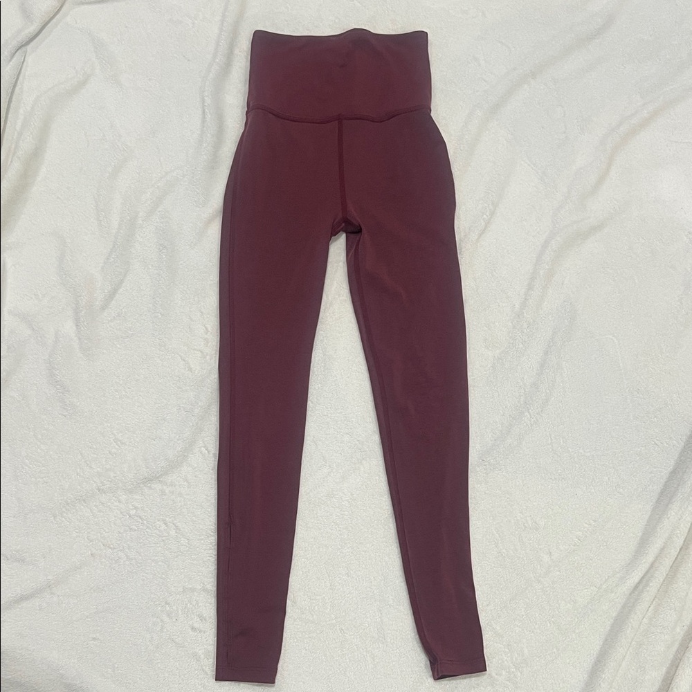 High-Waisted Leggings with below knee side cut-outs. Excellent condition.